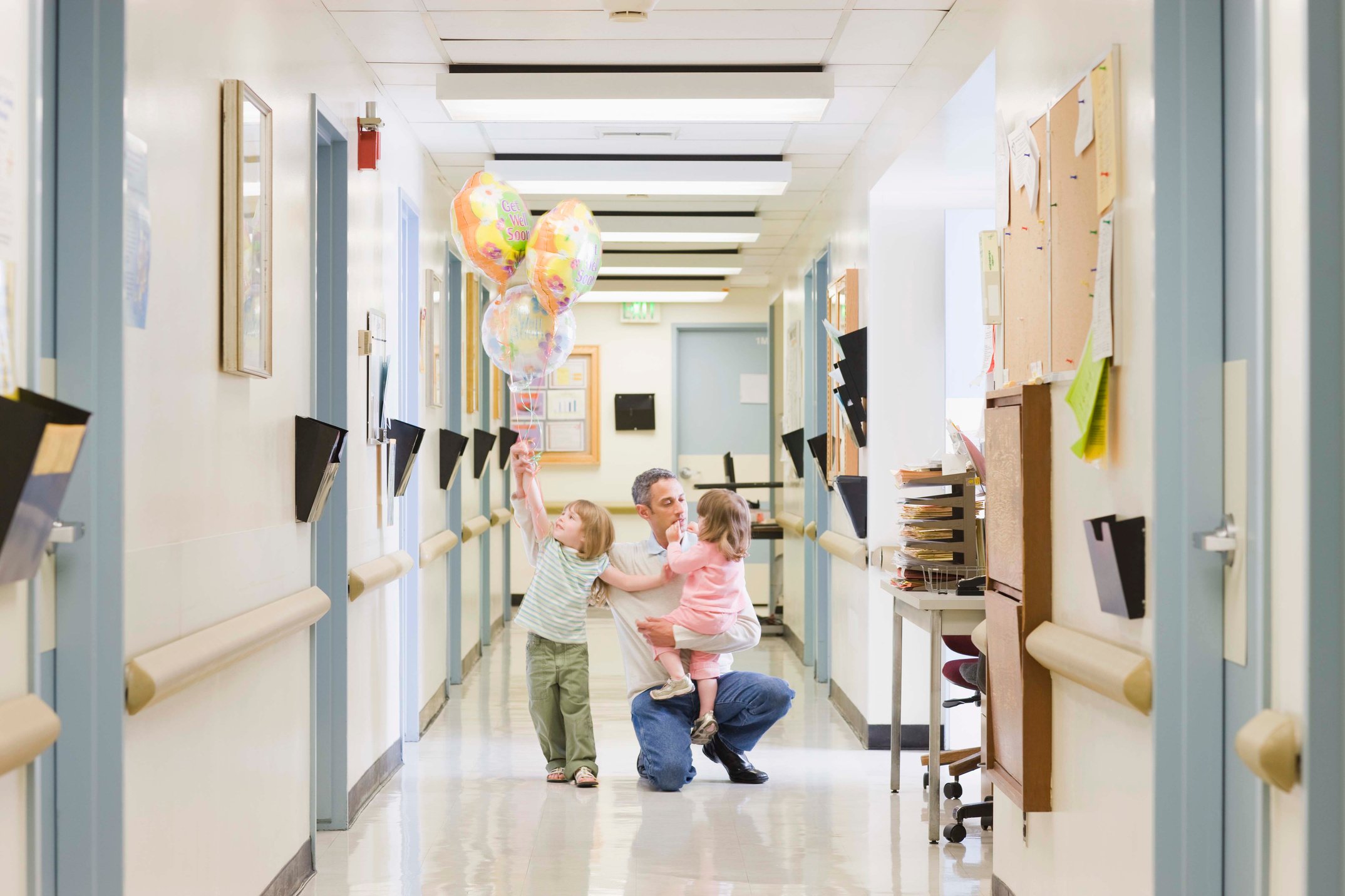 Man with children in hospital